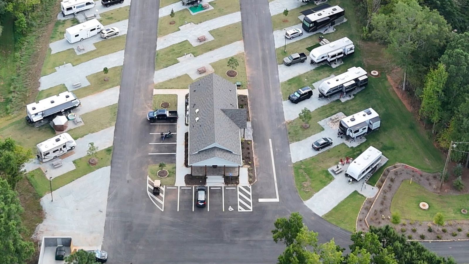 Bath house and gravel RV sites from above